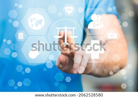Doctor hand presses the button icon justice healthcare. Labor Law Lawyer Legal Concept in medical on the theme of healthcare.