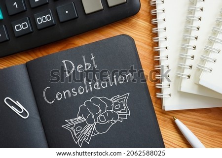 Debt consolidation is shown on a business photo using the text