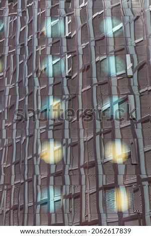 skyscraper reflected in the glass facade