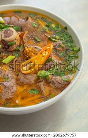 Close up photo of traditional Vietnam noodles Bun Bo Hue