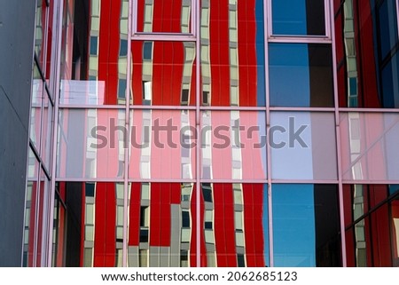 Reflections in the glass of a modern building. 