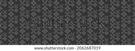 Abstract background pattern with gray decorative ornament on a black background for your design. Seamless background for wallpaper, textures. Vector image. 
