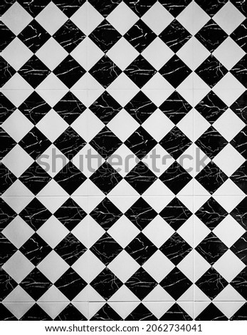 Tiles. Beautiful vintage black and white tiles texture background floor.