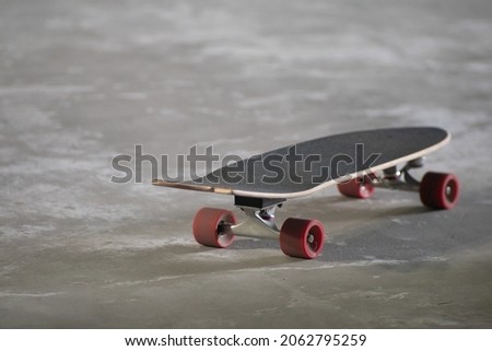 Surf Skate, extreme sport with four wheels on board sliding on street or pump track. Famous teenager sport in urban. 