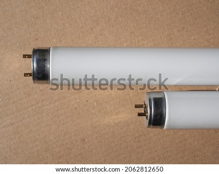 fluorescent neon tubes low pressure mercury vapor gas discharge lamps Royalty-Free Stock Photo #2062812650