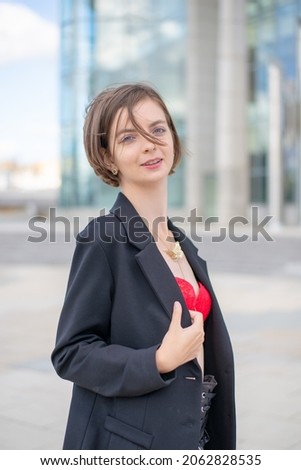 Business girl in black suit.