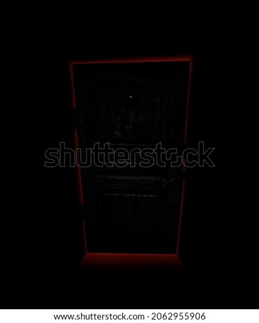 Creepy old door glowing with sinister red light at black background. Doorway into hell, concept of evil, horror, infernal place.