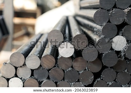 Steel bar cutting. Steel bar cut on a band saw for industrial use  Royalty-Free Stock Photo #2063023859