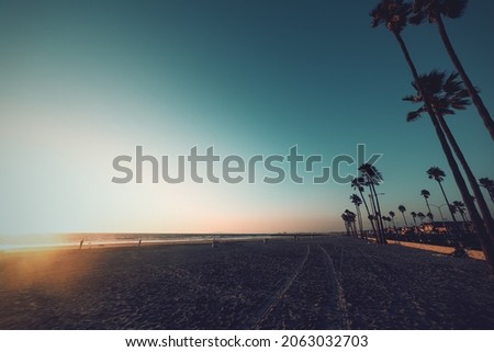 Newport Beach shore under a clear sky at sunset. California, USA