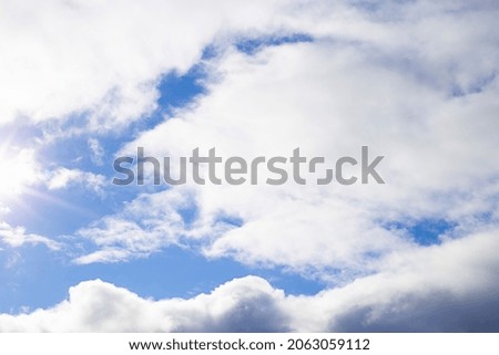 Natural abstract background - blue sky and white clouds.