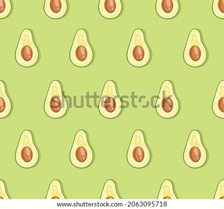 Avocado pattern on green background. Minimal flat lay style. Top view