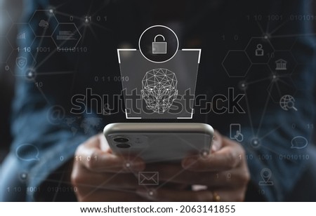 Technological Scanning. Biometric Facial Recognition. Face Id. Technological Scanning face of woman to identify and login for mobile phone user, cyber security, personal data protection concept Royalty-Free Stock Photo #2063141855