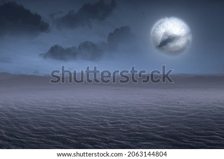 Desert with a full moon with the night scene background