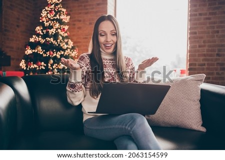 Photo of funky mature lady sit talk laptop wear jumper jeans new year at home Royalty-Free Stock Photo #2063154599