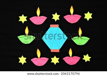 Colorful vector of Diyas and rangoli on the occasion of Diwali celebration. Hindu people decorate homes with lamps, rangoli and lights during Diwali celebration