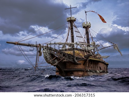 Abandoned historic sailing ship in the stormy sea. Wooden sailboat sails in a storm at sea.  A mysterious boat in stormy ocean waves. Royalty-Free Stock Photo #206317315