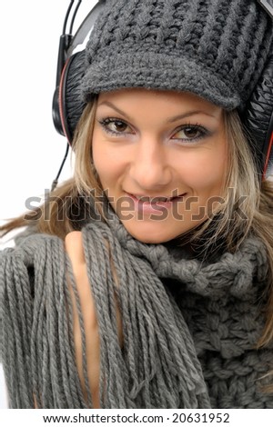 fashion girl with winter clothes and headphones