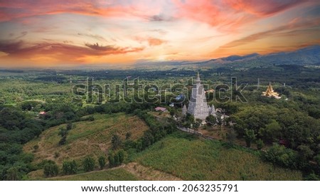 Top view , Bodh Gaya Pagoda in the temple resembles Bodh Gaya in India. It is a place of worship for Buddhist people. , thailand Royalty-Free Stock Photo #2063235791