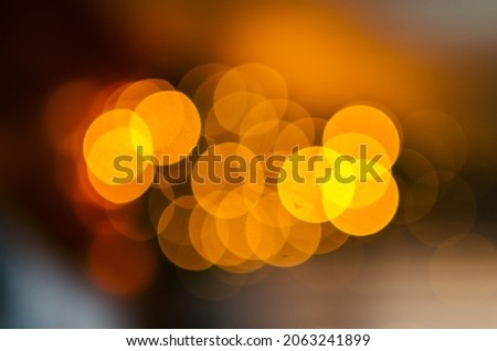 Blurred Abstract christmas background with garlands without focus. Background for text and postcards. Concept for Christmas 2022