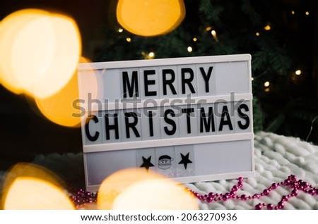 Merry Christmas displayed on trending lightbox, concept image