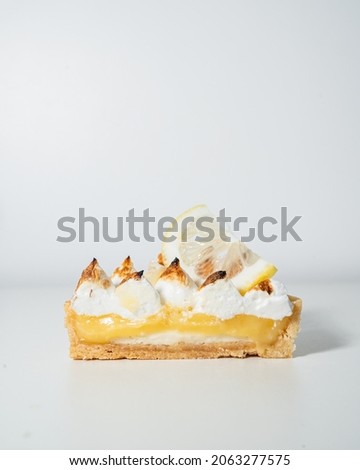 Lemon tart cake on white background,Food concept for restaurant and bakery shop.