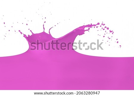 pink paint splashing on white