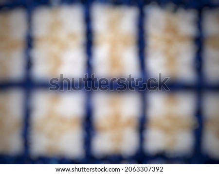 Blurred towel background with blue square patterns. Background abstract arts.