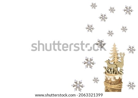 Christmas composition. Christmas items on a white background. Christmas, winter, new year concept. Flat lounger, top view, copy space. Figures of snowflakes and elk