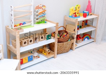 Montessori material, Kindergarten Preschool Classroom Interior, wooden furniture and toys, didactic materials Royalty-Free Stock Photo #2063335991