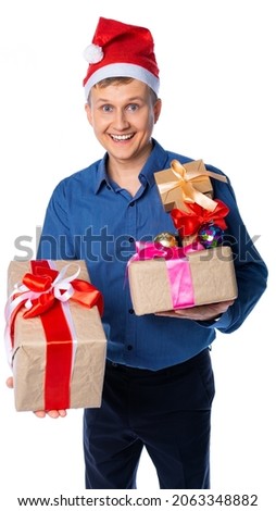 man in a suit with gifts in santa claus hat holds gifts, wishes a happy new year, christmas. isolated, white background