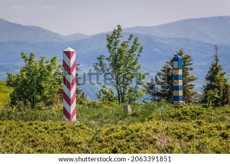 Border markes on a Polish-Ukraine boundary, seen from a trail in Bieszczady Mountains National Park, Poland Royalty-Free Stock Photo #2063391851