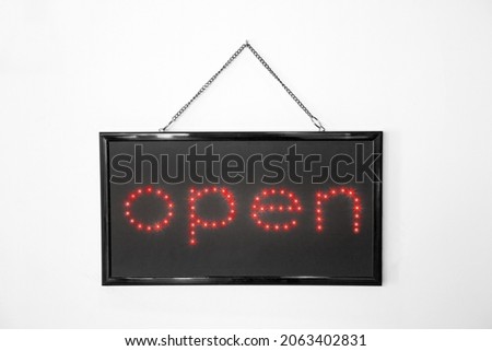 Open neon sign on a white background