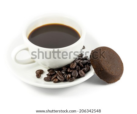 Coffee cup with roasted coffee beans and used ground coffee on white background.