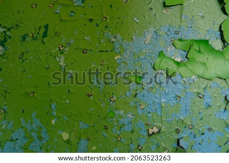 stone wall with old green paint. background for design. High quality photo