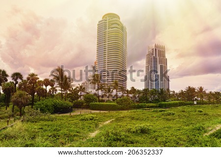 Beautiful Sunset with luxury ocean front condos at Miami South Beach, Florida, United States.