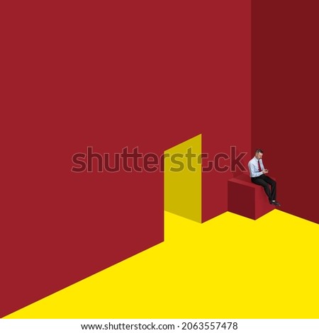 Contemporary art collage of businessman with phone sitting on cube at the corner isolated on red yellow background. Concept of career, work, project, growth, imagination, creativity. Copy space for ad