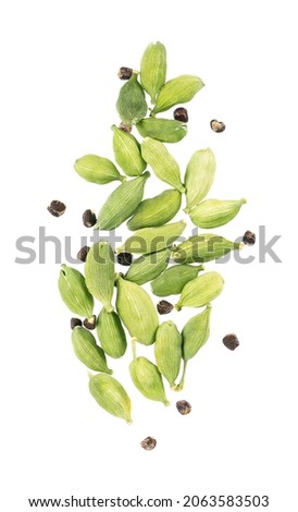 Cardamom pods isolated on white background. Green cardamon seeds. Clipping path. Top view. Royalty-Free Stock Photo #2063583503