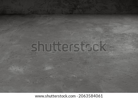 Gray concrete background at an angle for placing objects and design in perspective.