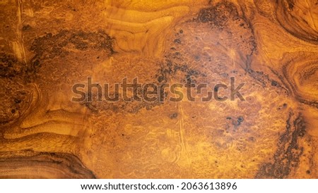 Light brown briar wood background Royalty-Free Stock Photo #2063613896