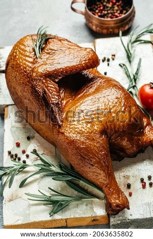 smoked chicken meat on wooden board. Turkish cuisine. vertical image. top view.