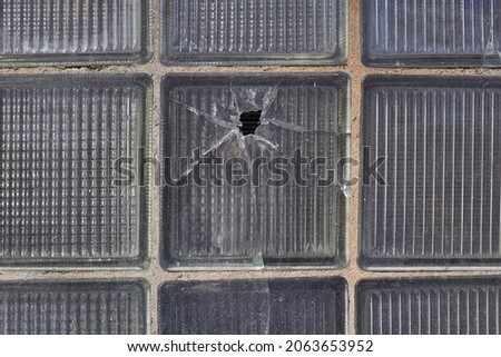 Background of old broken square windows, glass tiles