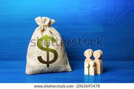 Family figurines and dollar money bag. Social policy, family budget. Investment in human capital. Favorable conditions for population growth. Medicine and demography. Income and expenses Royalty-Free Stock Photo #2063695478