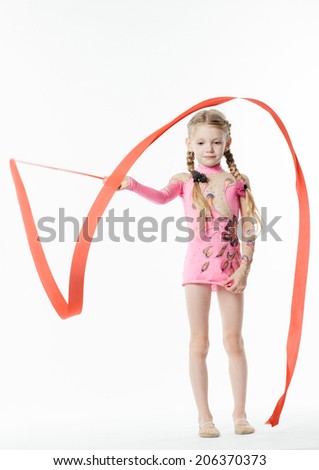 little beautiful girl gymnast doing exercises