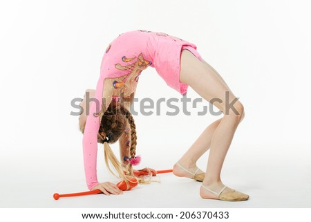 little beautiful girl gymnast doing exercises