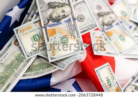 American dollars and flag. Stock images. Top image