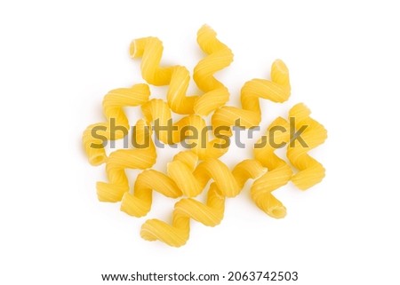 raw pasta cavatappi isolated on white background with clipping path and full depth of field. Top view. Flat lay Royalty-Free Stock Photo #2063742503