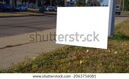 Blank Lawn Sign in Park