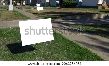 Blank Lawn Sign in Front Yard