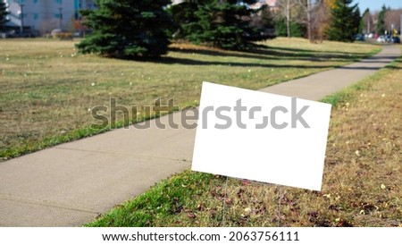 Blank Lawn Sign in Park