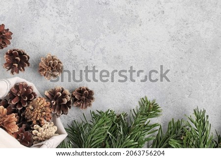 Zero waste and eco friendly christmas concept. Natural decorations and branches of a Christmas tree on the table, top view, flatlay